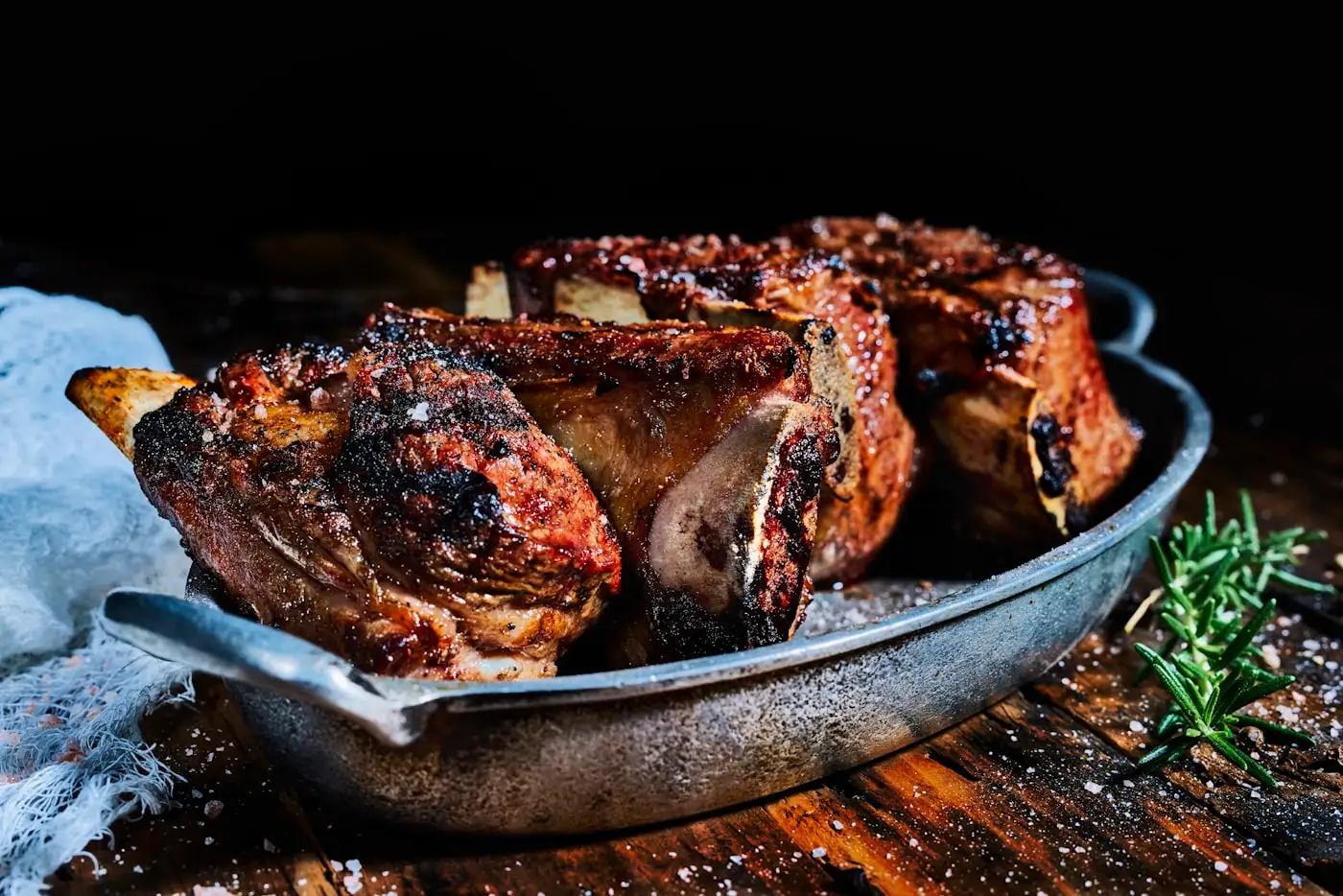 Ribs glazed and charred at the edges