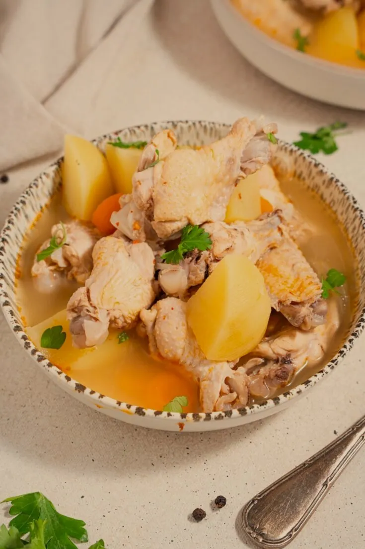 Chicken souse, lime-bright broth with potato and carrot